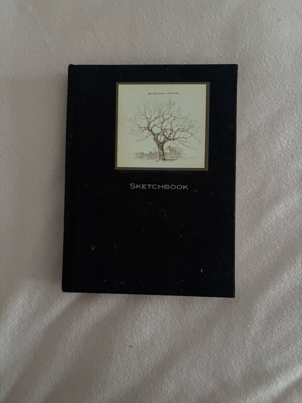 Black Sketchbook with Tree Illustration